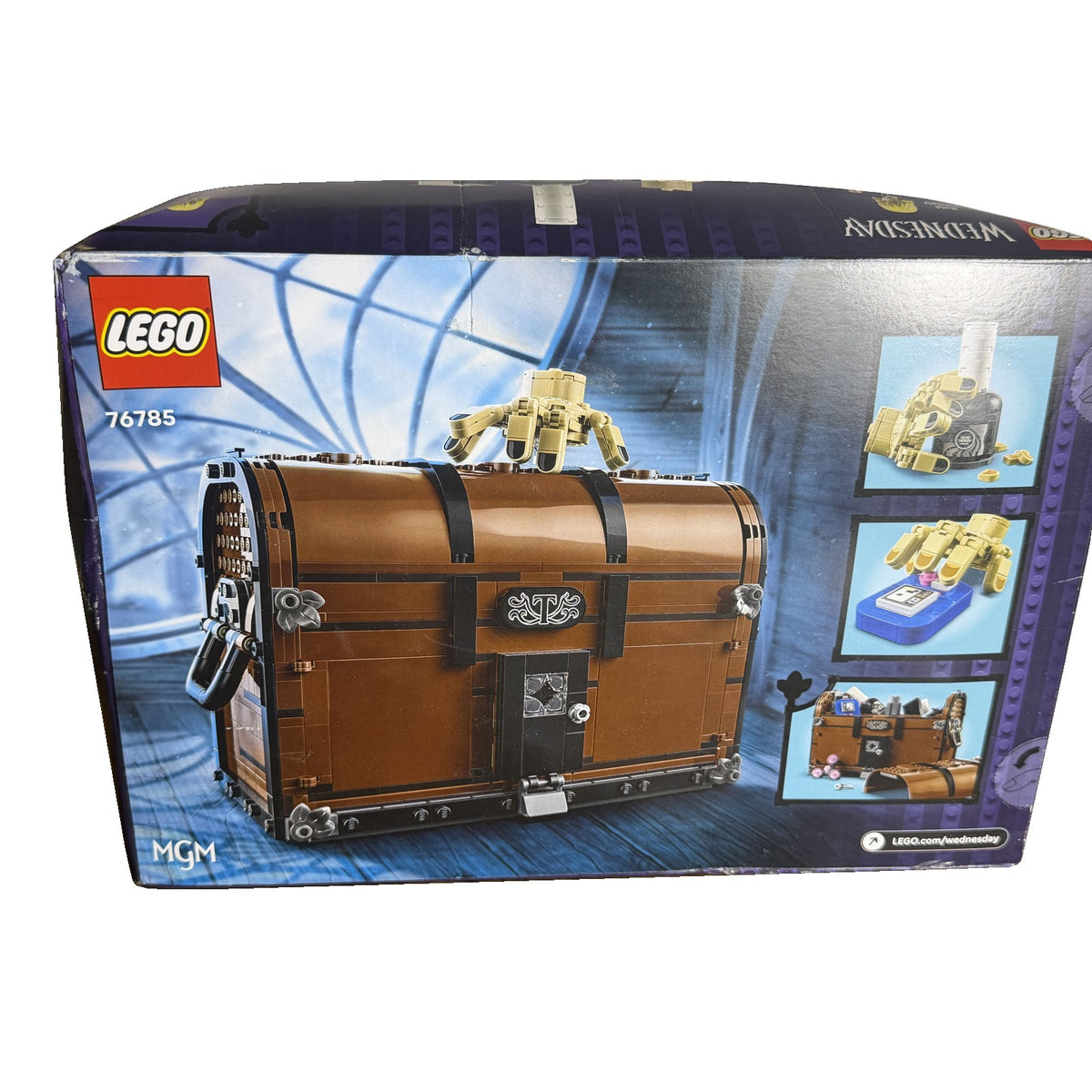 Lego Wednesday Thing's Apartment building toy set 76785 with damaged box, featuring detailed Lego bricks and miniatures.