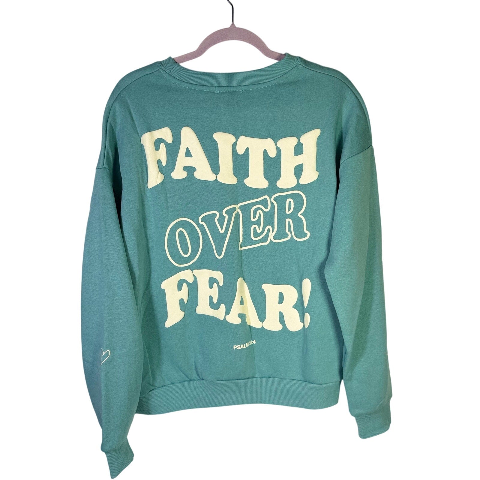 Green Seventh & Sunset Faith Over Fear Christian crewneck sweatshirt, medium size, featuring printed motivational message.