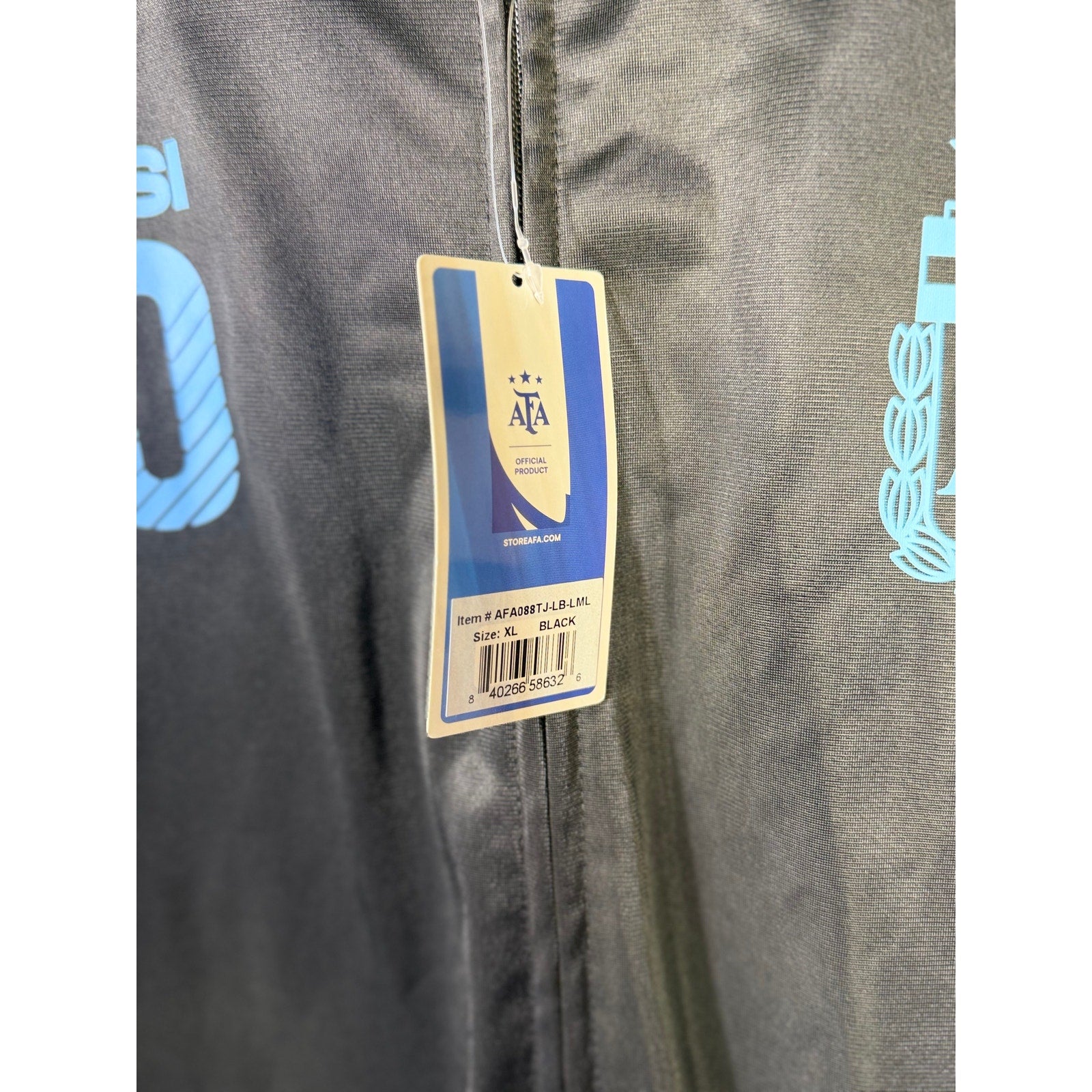AFA Argentina Messi #10 full zip black and blue track jacket with official branding, shown on a hanger.