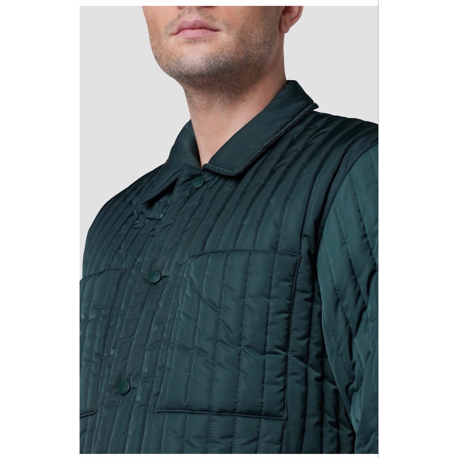 Hudson men's green quilted snap front coat, size medium, featuring a stylish padded design and front snap closures.