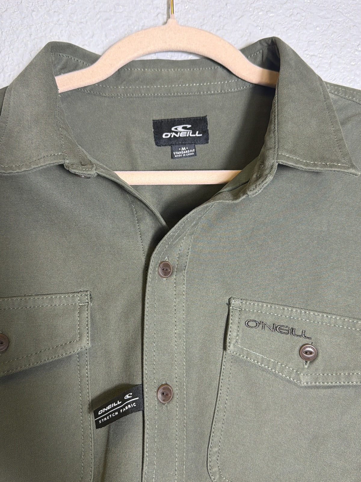 O'Neill Unified Overshirt Stretch Button-Up Shirt Jacket in olive for men, casual style, front view with button details.