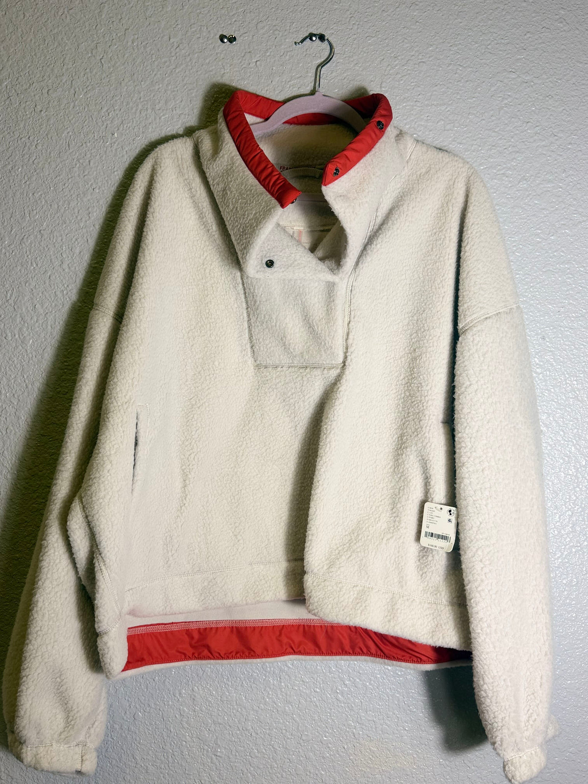 Free People FP Movement ivory fleece pullover for women, featuring Tofu color combo and a comfortable, casual fit.