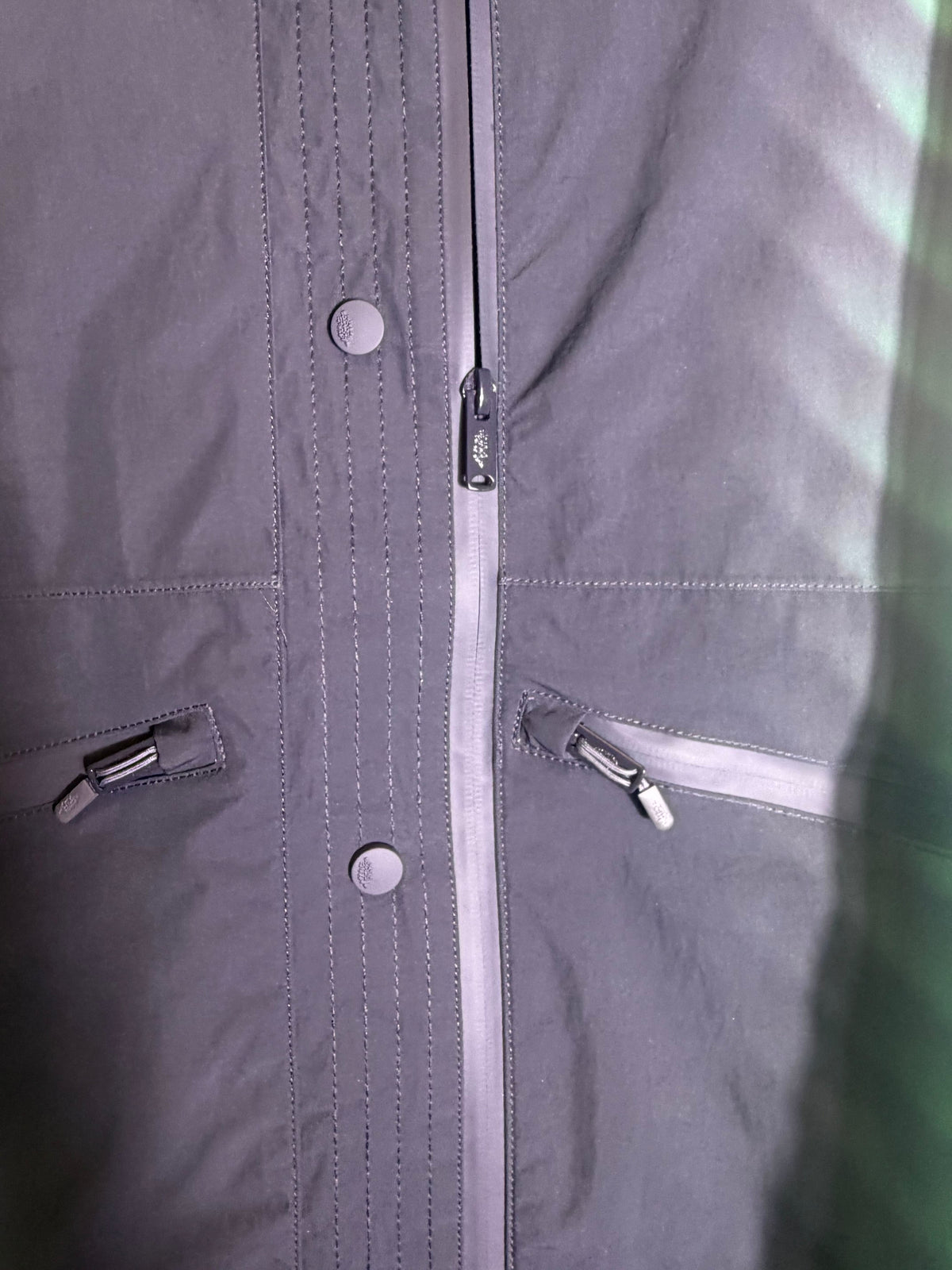 Green and black FP Movement Alien Combo hooded anorak jacket for women, XS, featuring a stylish design and comfortable fit.