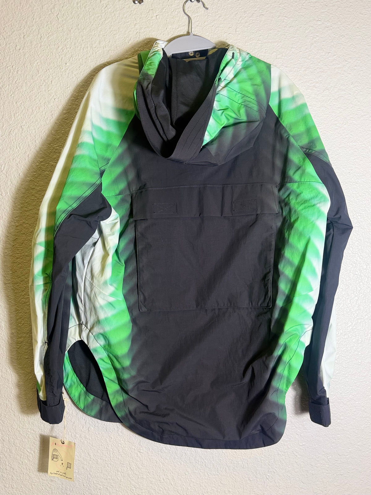 Green and black Free People FP Movement Alien Combo hooded anorak jacket for women, size XS, with a stylish, casual design.