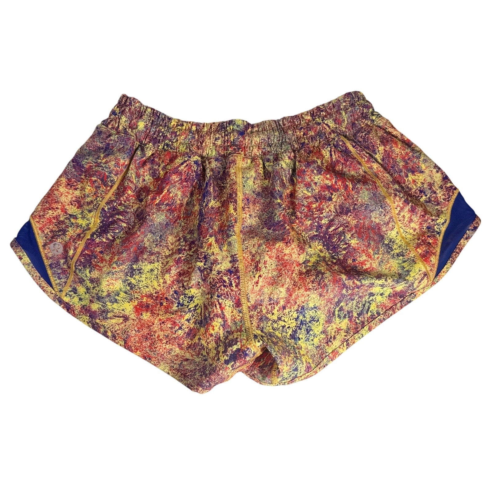 Lululemon women's printed navy running shorts with multicolor design, size 6, featuring lightweight fabric and elastic waistband.