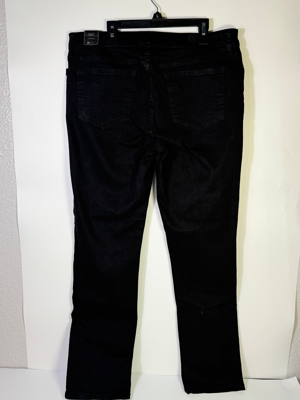 KUT from the Kloth black straight leg jeans for women, size 12, showing the fit and classic denim style.