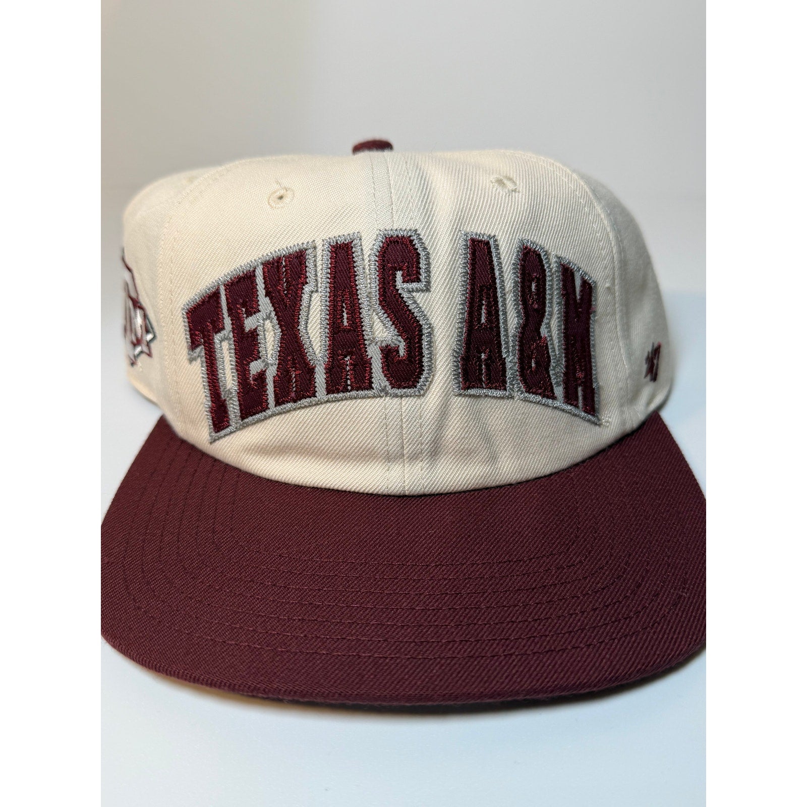 47 Brand Texas A&M Aggies snapback hat in cream and maroon with adjustable strap and embroidered team logo on front.
