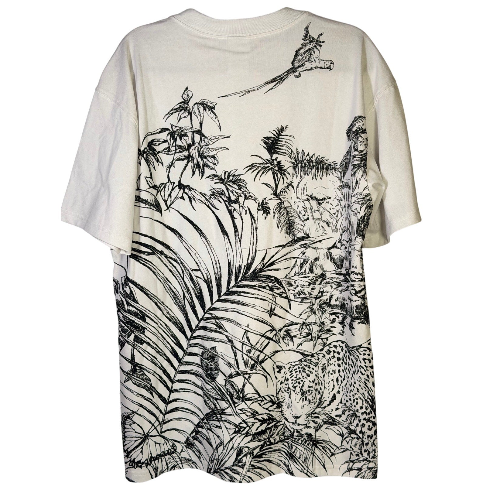 Nike ACG men's jungle animal graphic Dri-FIT T-shirt, small size, featuring vibrant jungle print on soft fabric.