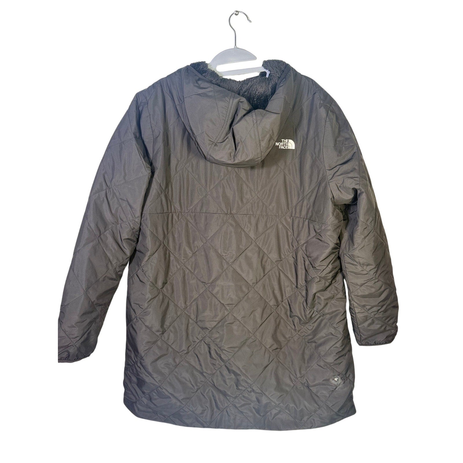 Black The North Face women’s Shady Glade insulated parka jacket with a hood, shown in size XL, displayed on a hanger.