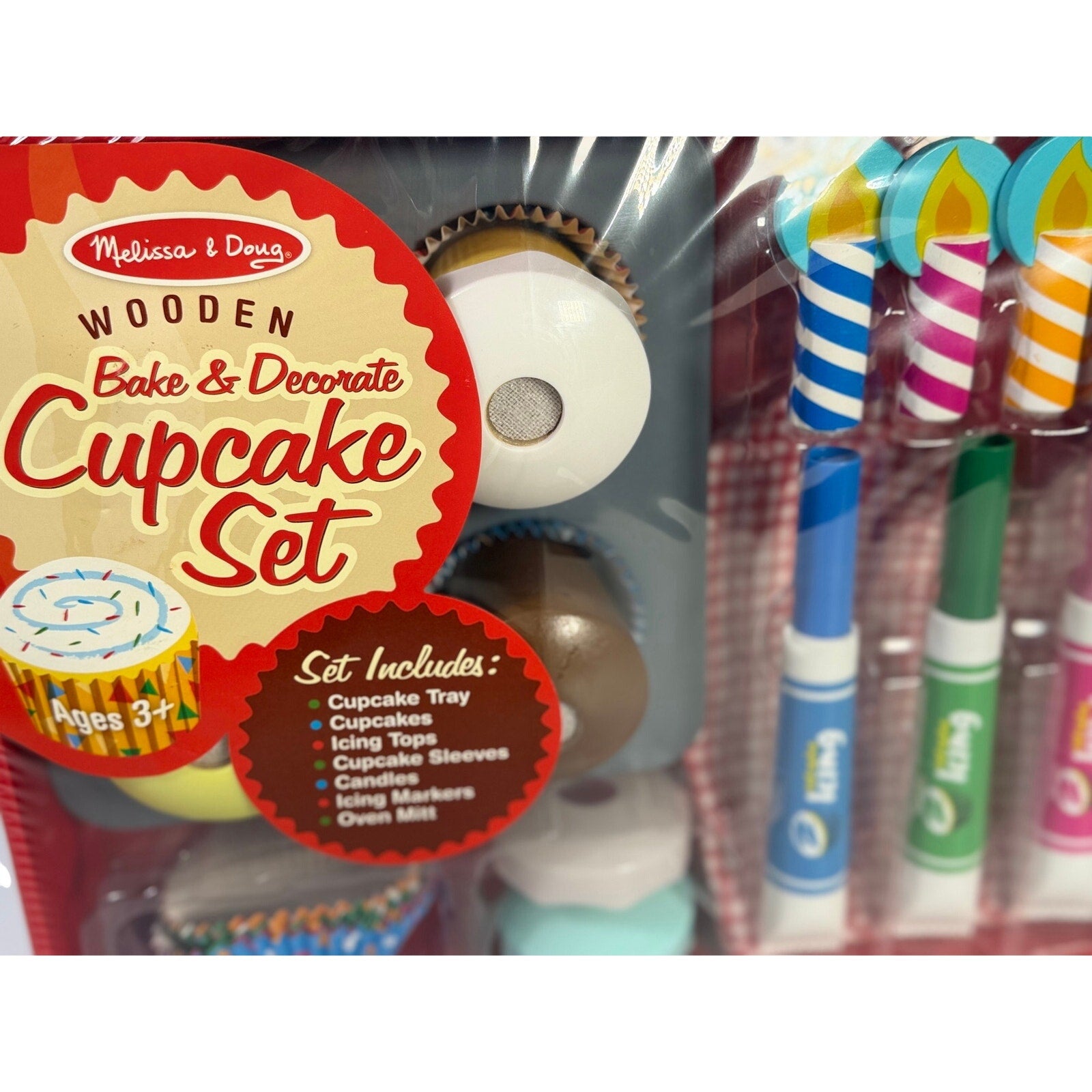 Melissa & Doug wooden cupcake set for pretend play, includes colorful cupcakes and decorating accessories, perfect for imaginative kitchen play.