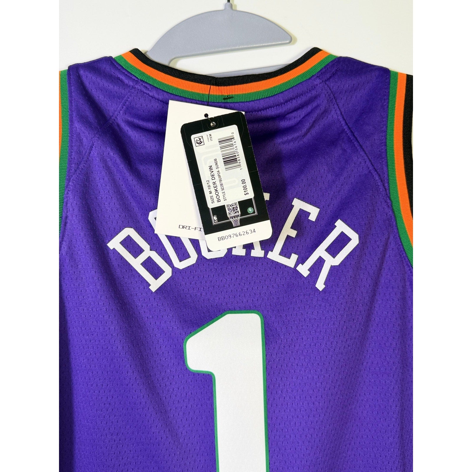 Nike NBA Phoenix Suns Devin Booker #1 City Edition youth swingman jersey, size M, featuring team colors and player number.
