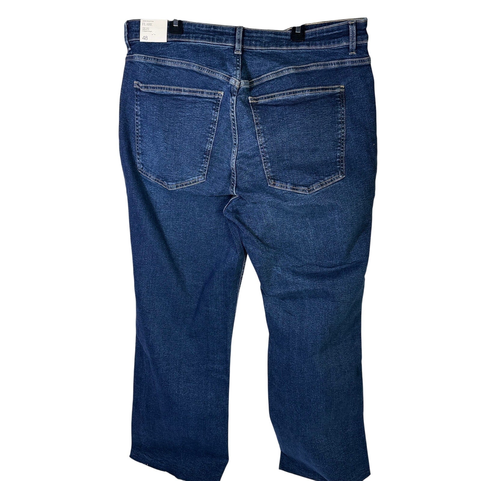 MNG women’s medium wash straight-leg jeans in size 16, showing the classic fit and denim texture.