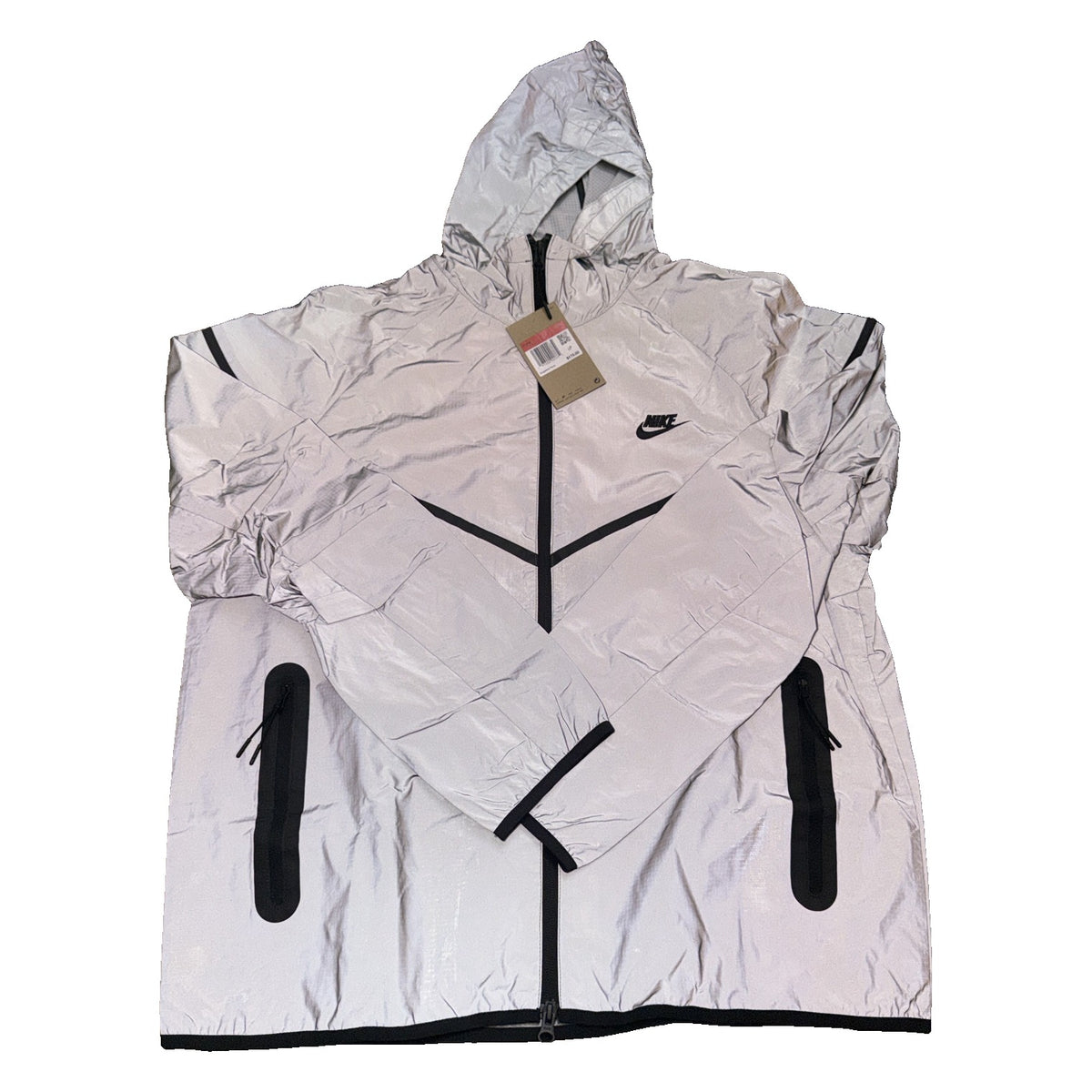 Nike Tech Windrunner men's reflective full-zip hooded jacket in silver, showcasing lightweight fabric and hood with front zipper.