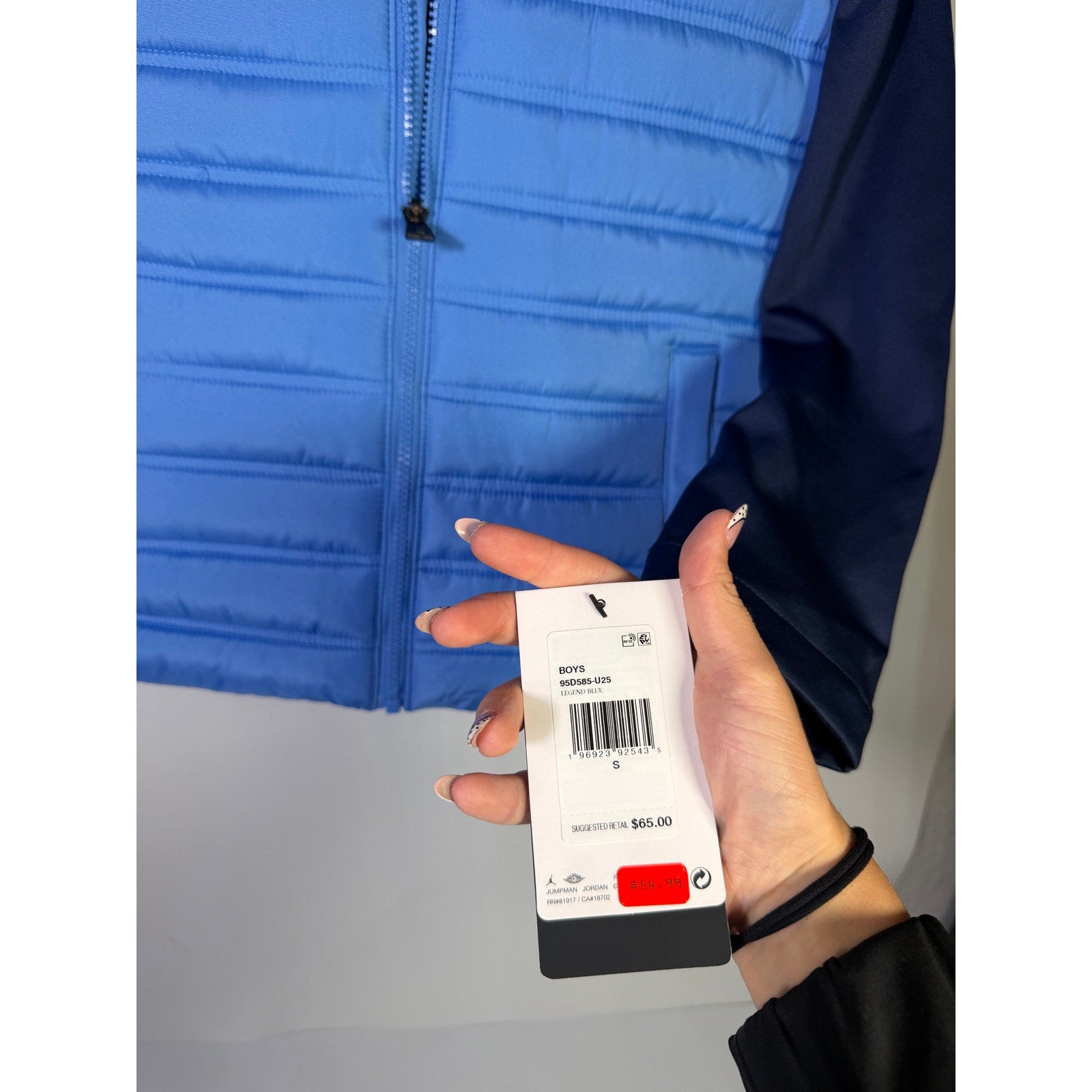 Jordan Boys Legend Blue Hybrid Puffer Jacket in size small, featuring a blue color and puffer style, new with tags.