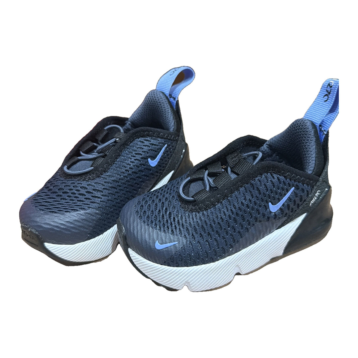 Nike Air Max 270 toddler sneakers in navy, blue, and white with visible branding and damaged box, size 4C.