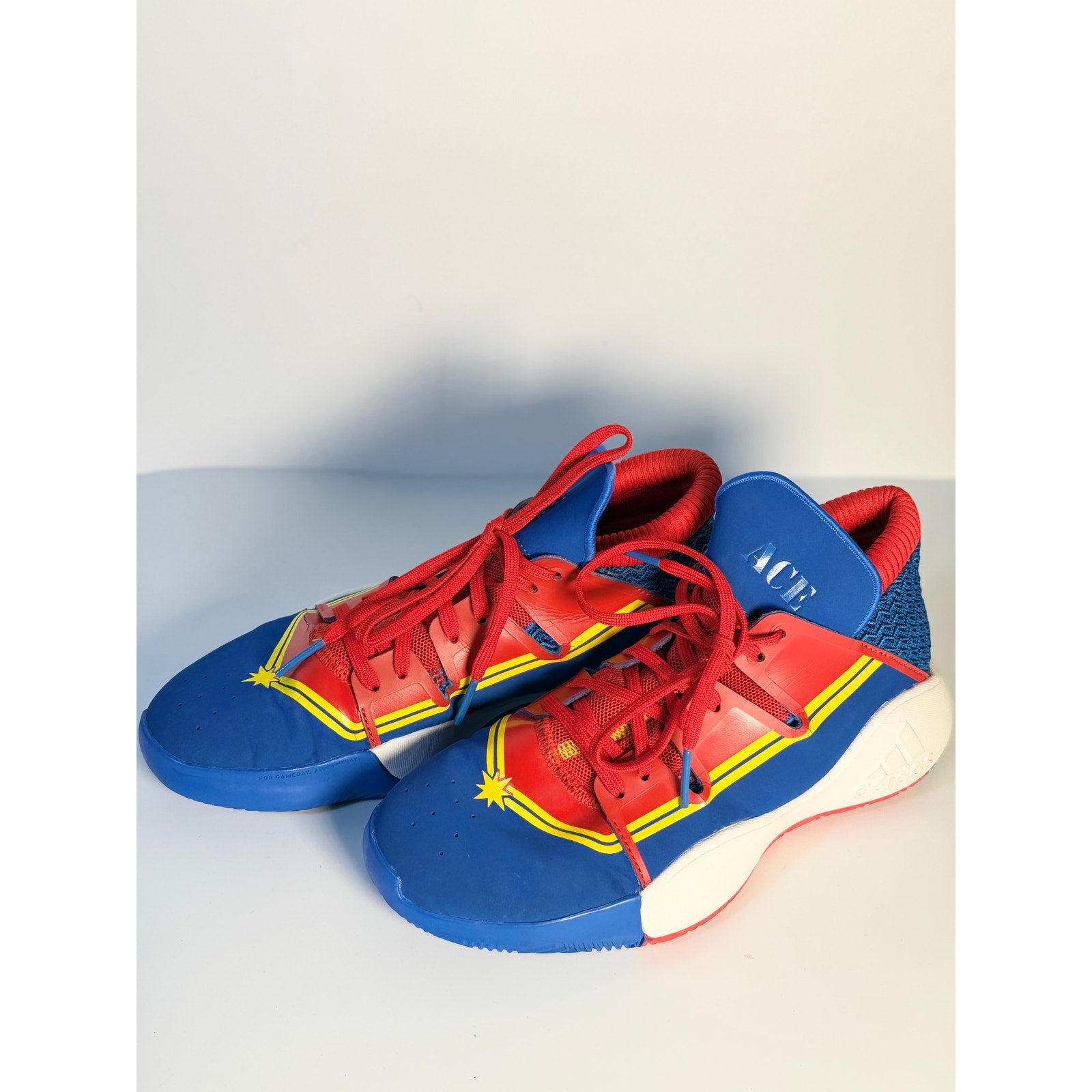 Adidas Exhibit A Captain Marvel basketball shoes in blue and red for men, US size 7, featuring sporty design and branding.