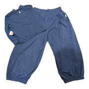 FP Movement women's midnight navy 2-piece set with mock neck top and jogger pants, stylish and comfortable clothing.
