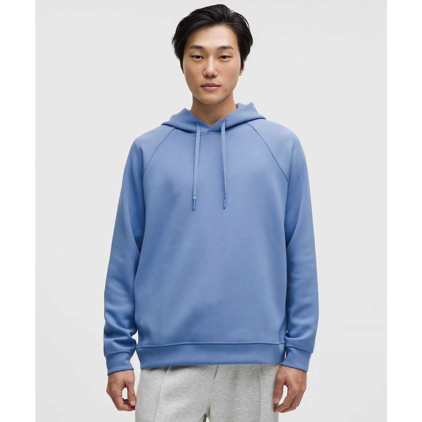 Blue Lululemon men's Smooth Spacer Pullover Hoodie, XL size, showing front view with soft fabric texture.