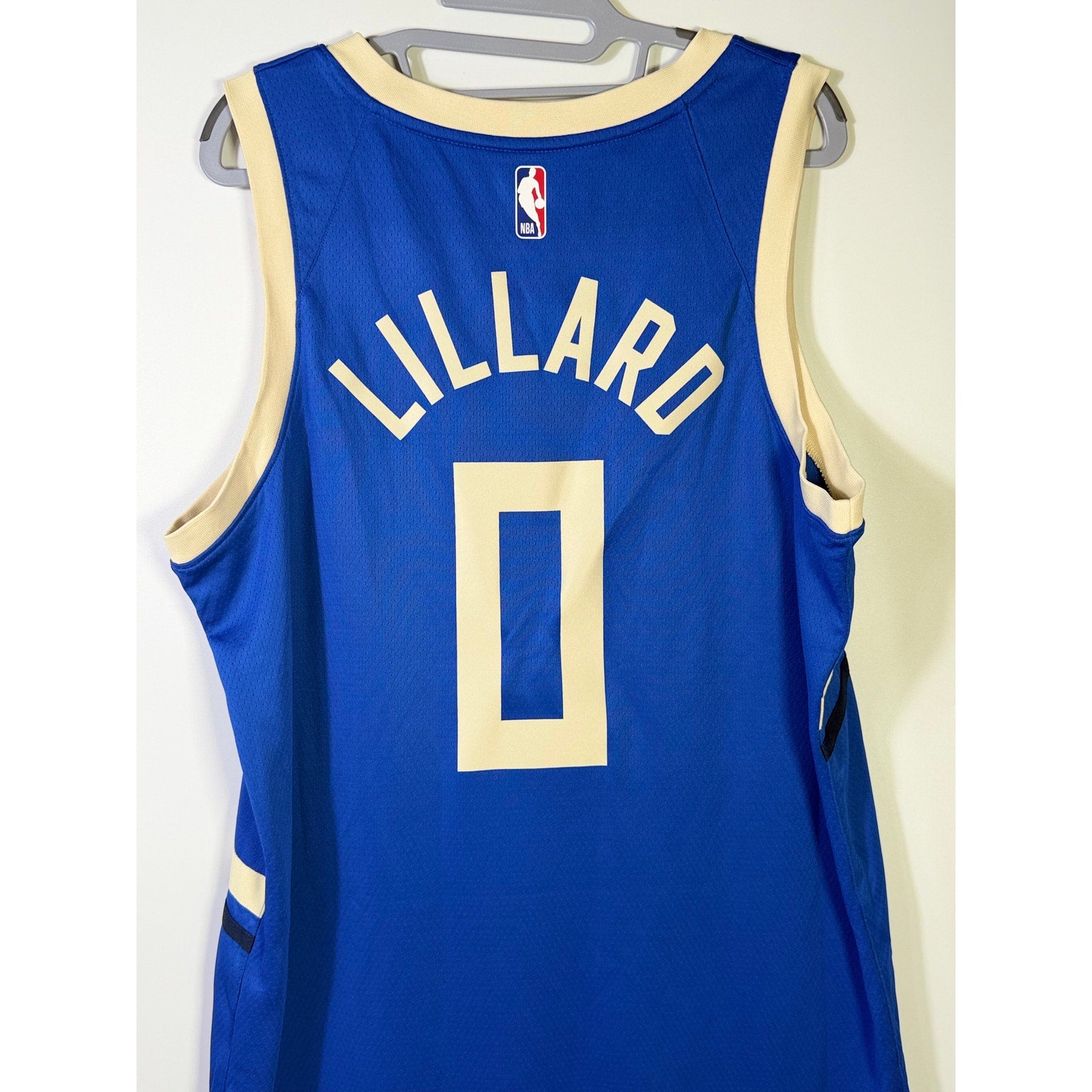 Nike Milwaukee Bucks Damian Lillard #0 City Edition Swingman Jersey for men, new with vivid team and player details visible.