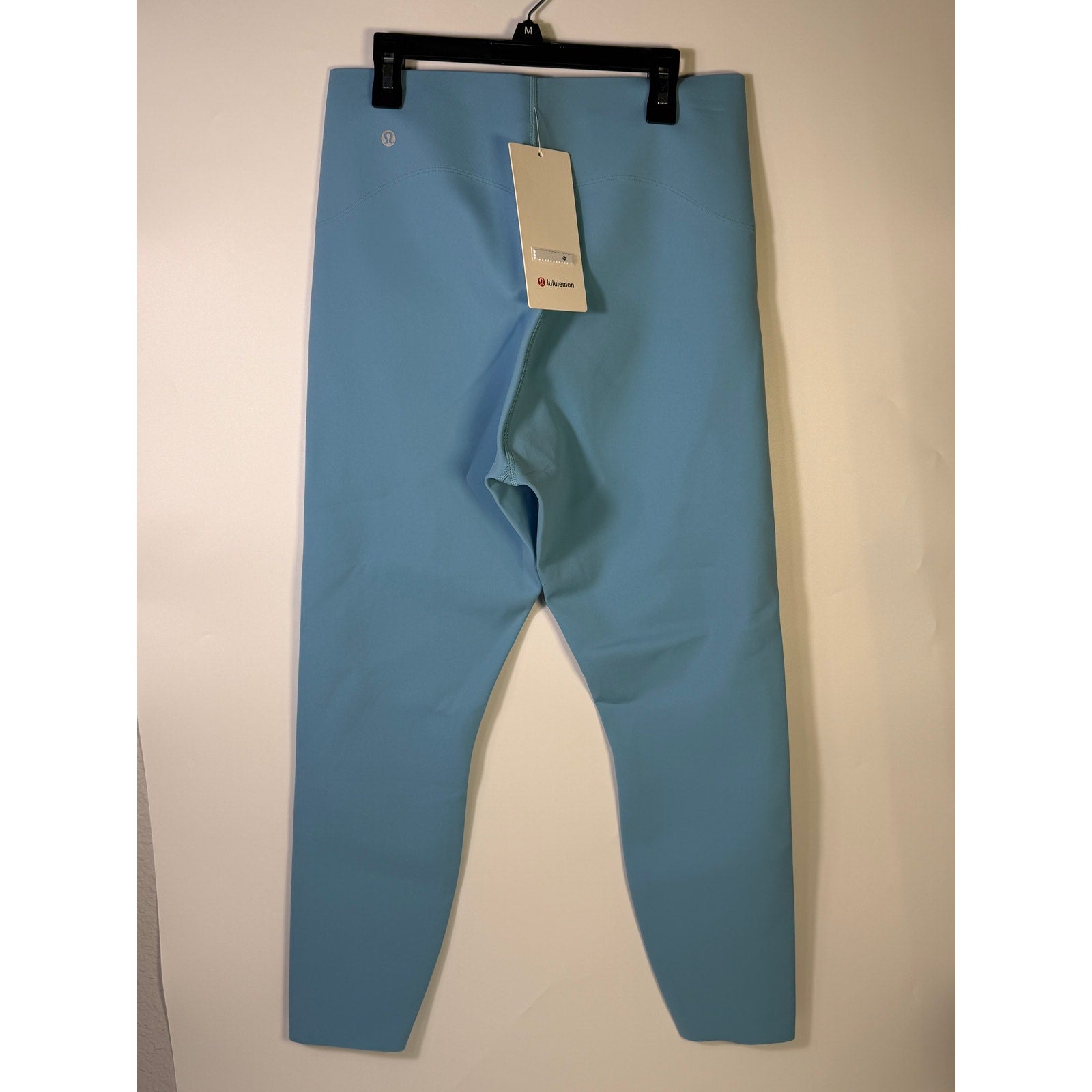 Lululemon Glow Up HR Tight 25-inch women's leggings in Windmill Blue, showing the form-fitting, high-rise design and smooth fabric.