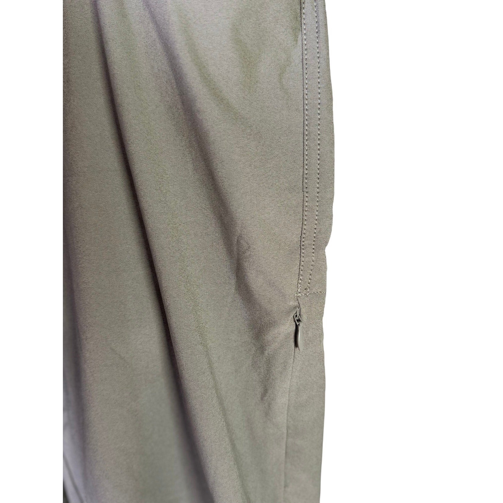 KÜHL Women’s gray hiking performance pants size 12 long, lightweight outdoor pants with a relaxed fit and functional design.