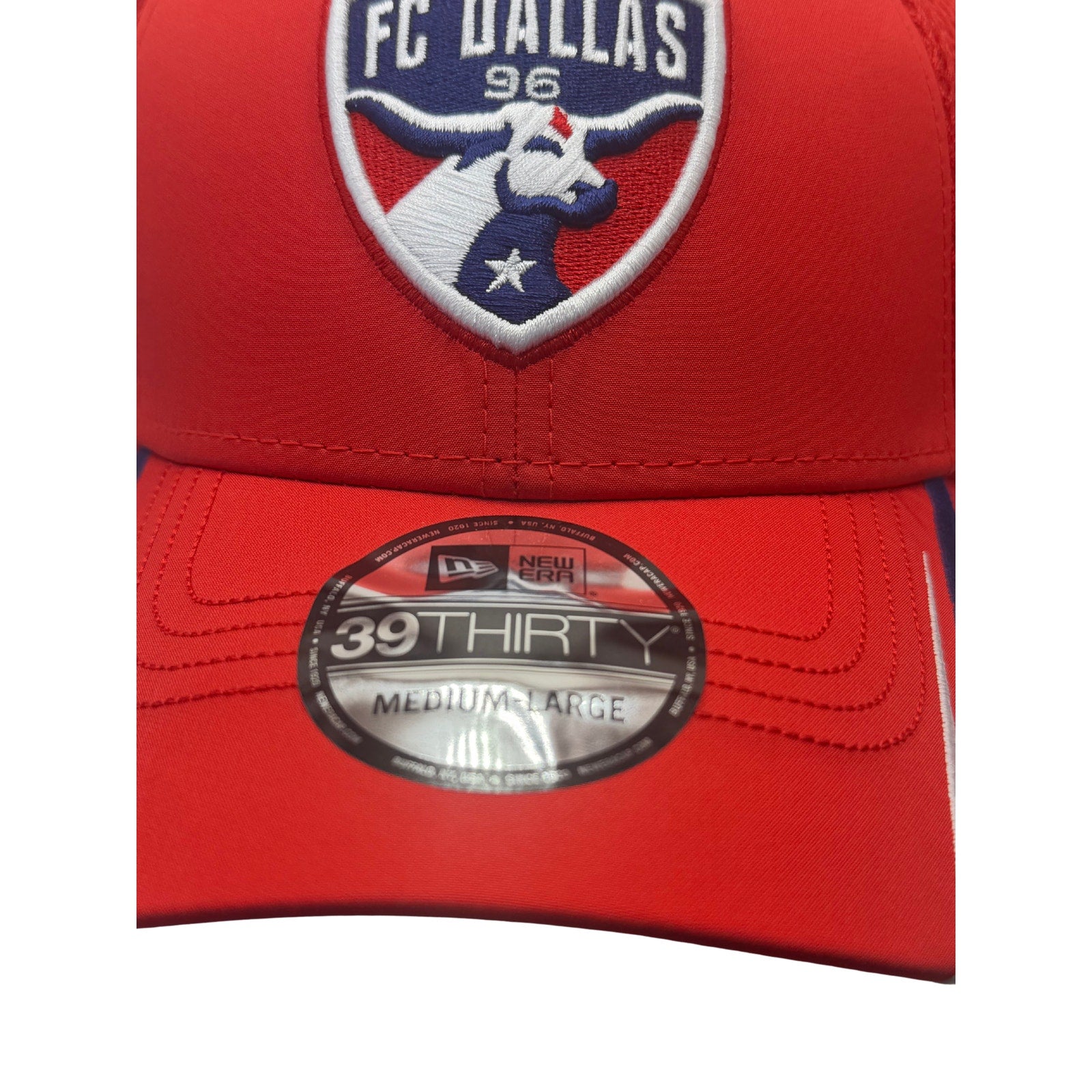 Red New Era FC Dallas 39THIRTY stretch fit hat with MLS logo, medium-large size, casual sports cap style.