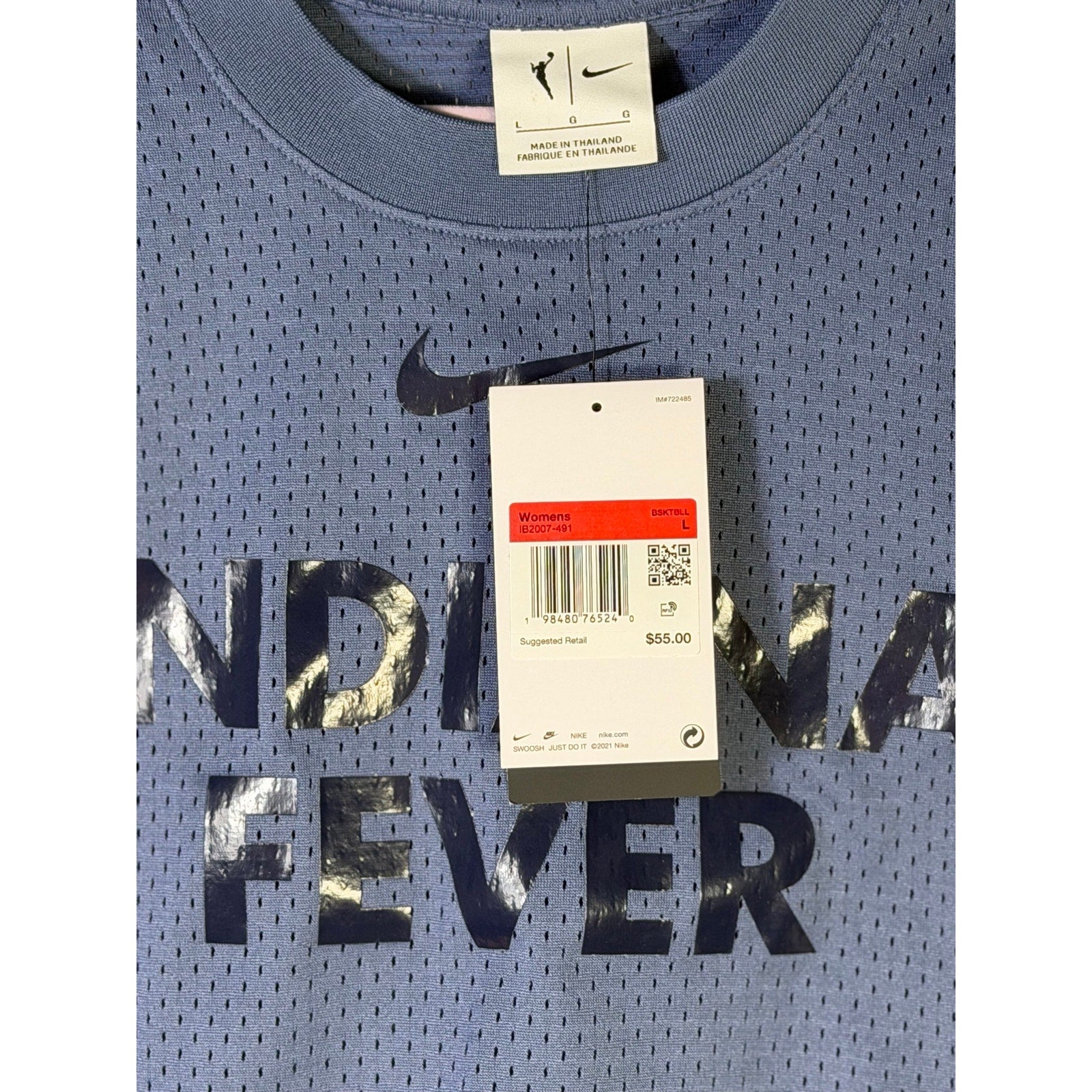 Nike WNBA Indiana Fever women's blue mesh basketball tank top, size L, front view with team logo and breathable fabric.