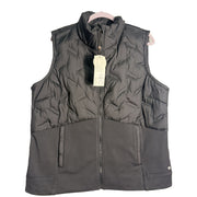 Women's CALIA Cold Dash Run Vest in pure black, XXL size, showing the lightweight vest with a high collar and sleeveless design.