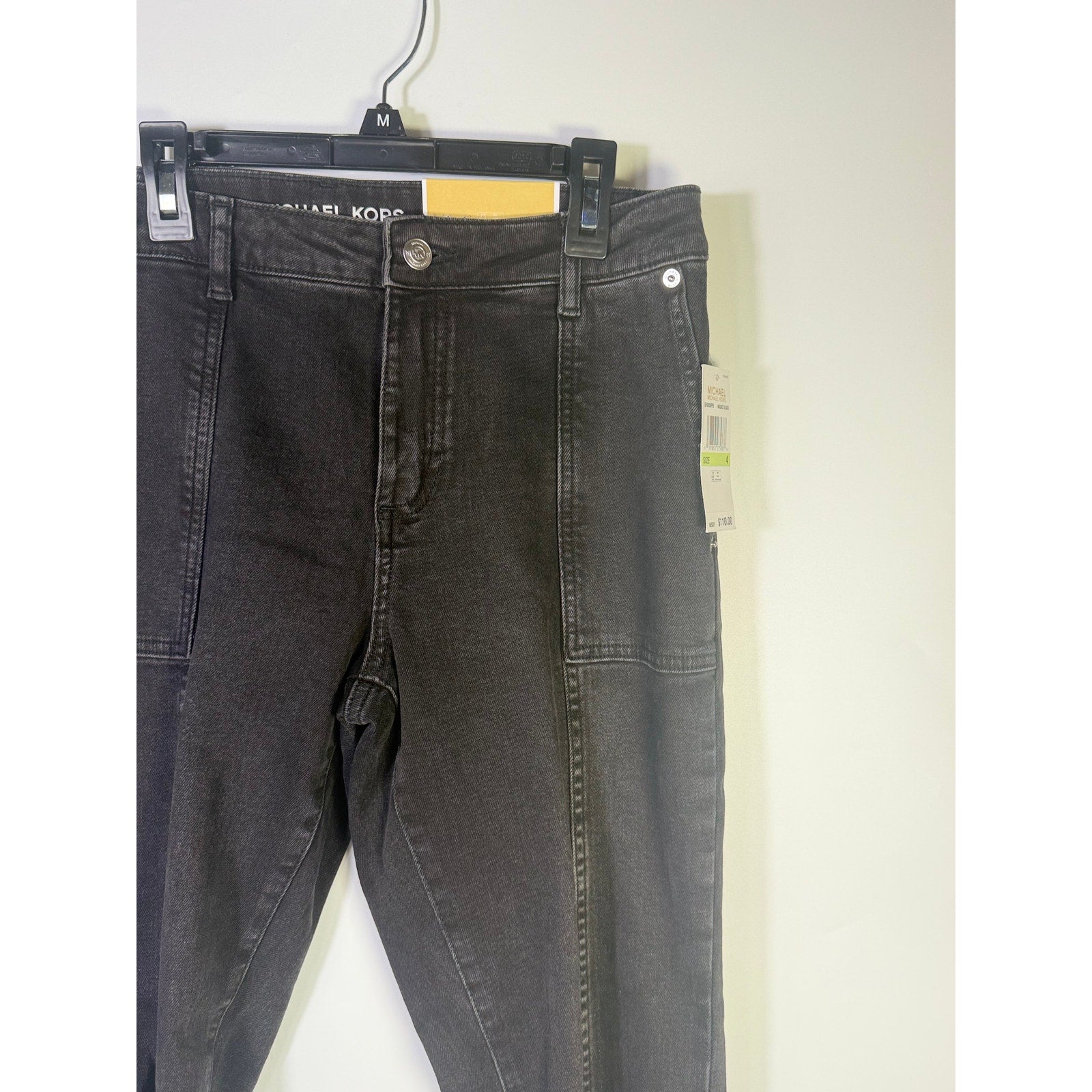 Michael Kors women's Selma cropped flare jeans in washed black, size 4, featuring a stylish fit and casual denim style.