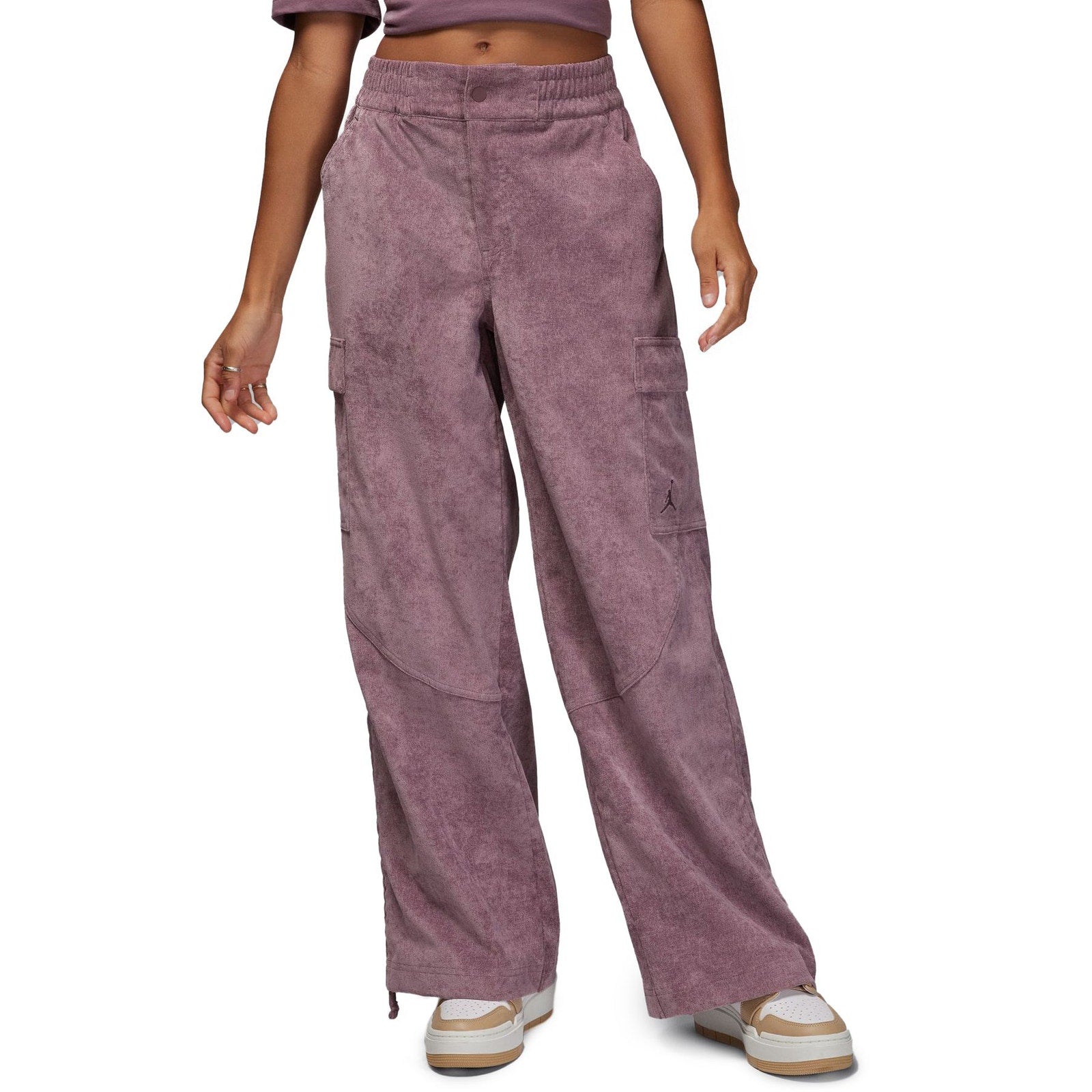 Jordan Chicago women's corduroy cargo pants in size small, featuring a relaxed fit and multiple pockets, styled for casual wear.