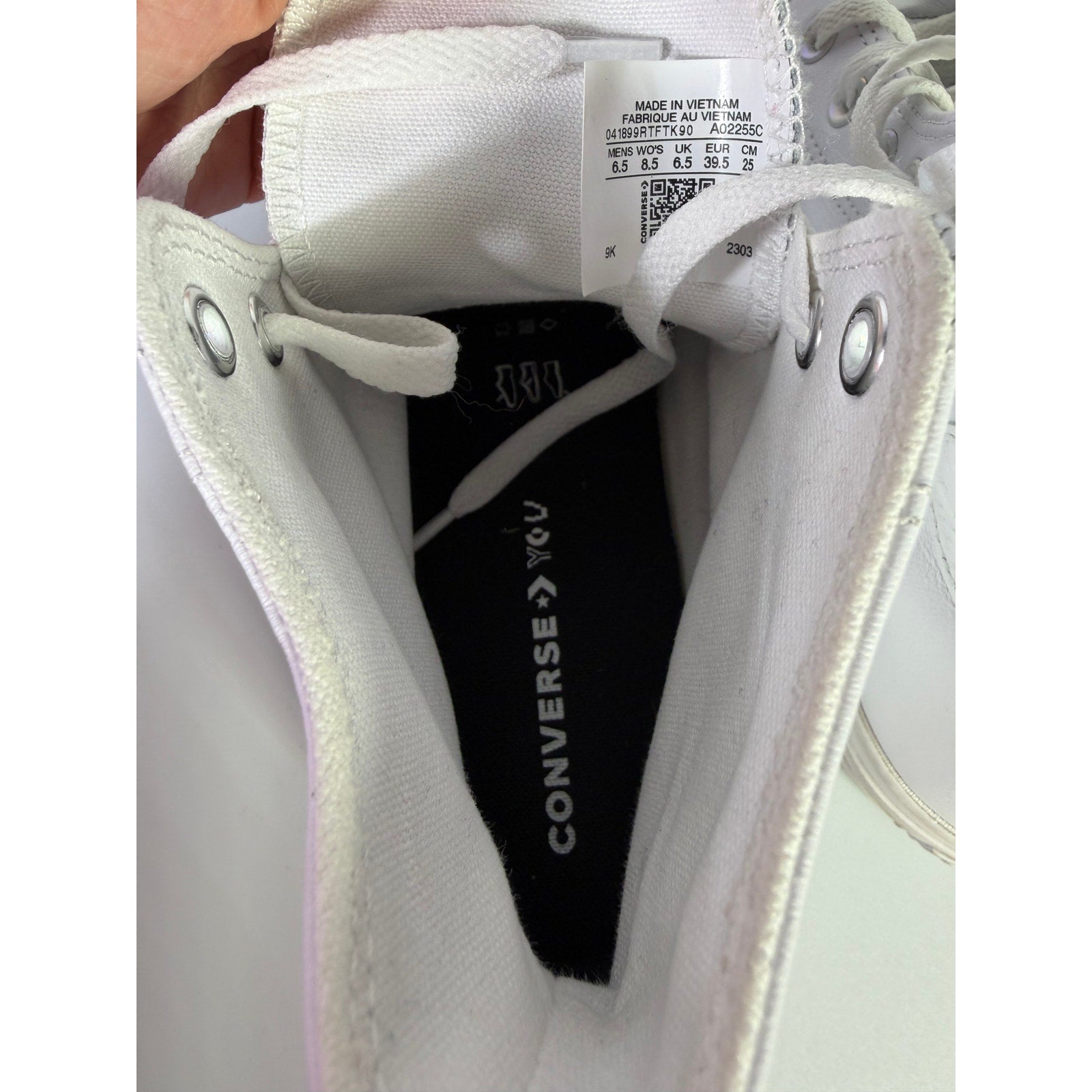White leather Converse Chuck Taylor All Star Lift Hi sneakers with platform sole, women's size US 8.5, shown from side view