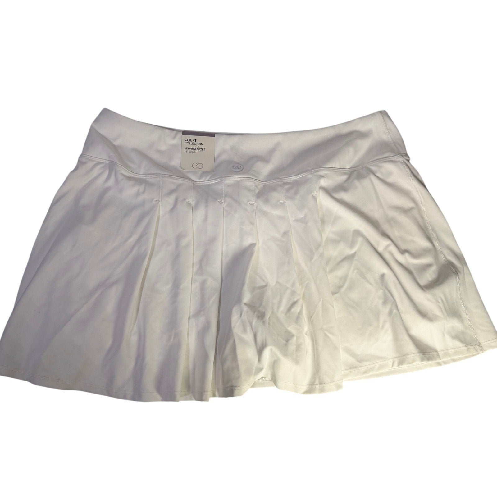 White CALIA women’s Court Collection high-rise 14-inch skort in size XL, showing the front view with pleats and sports waistband.