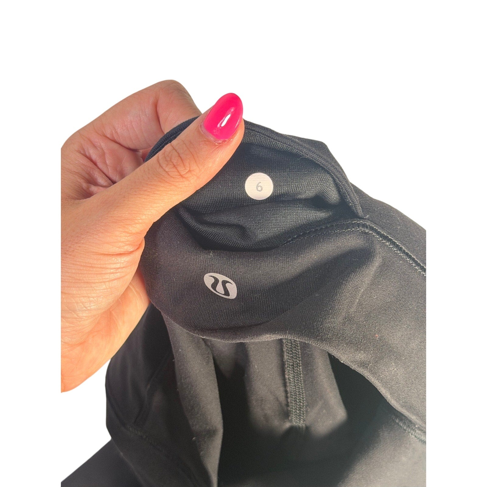 Lululemon women's black high-rise paneled cropped leggings with fitted waist and seamless design, size 6.