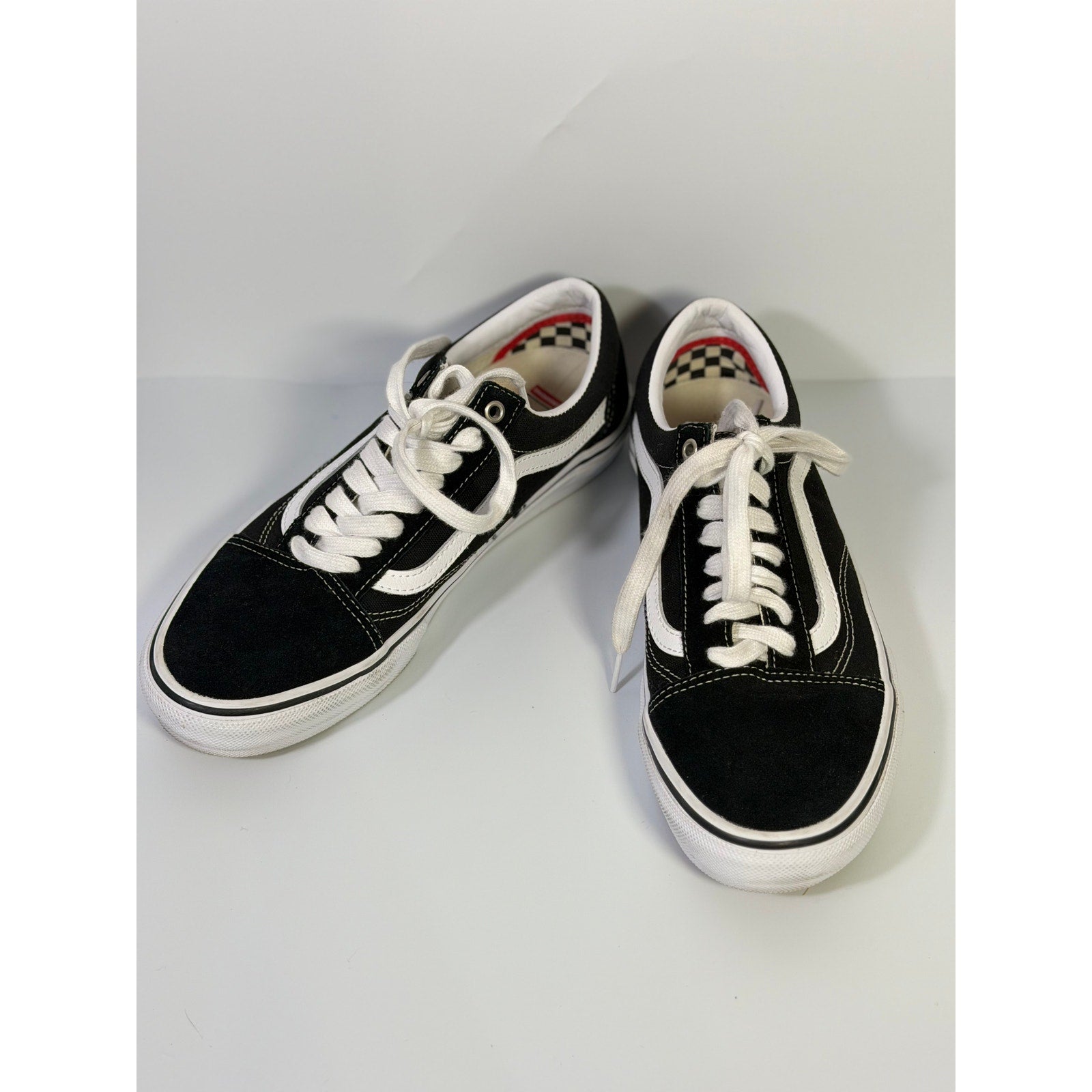 VANS Old Skool black and white low top skate sneakers for men and women with lace-up casual design