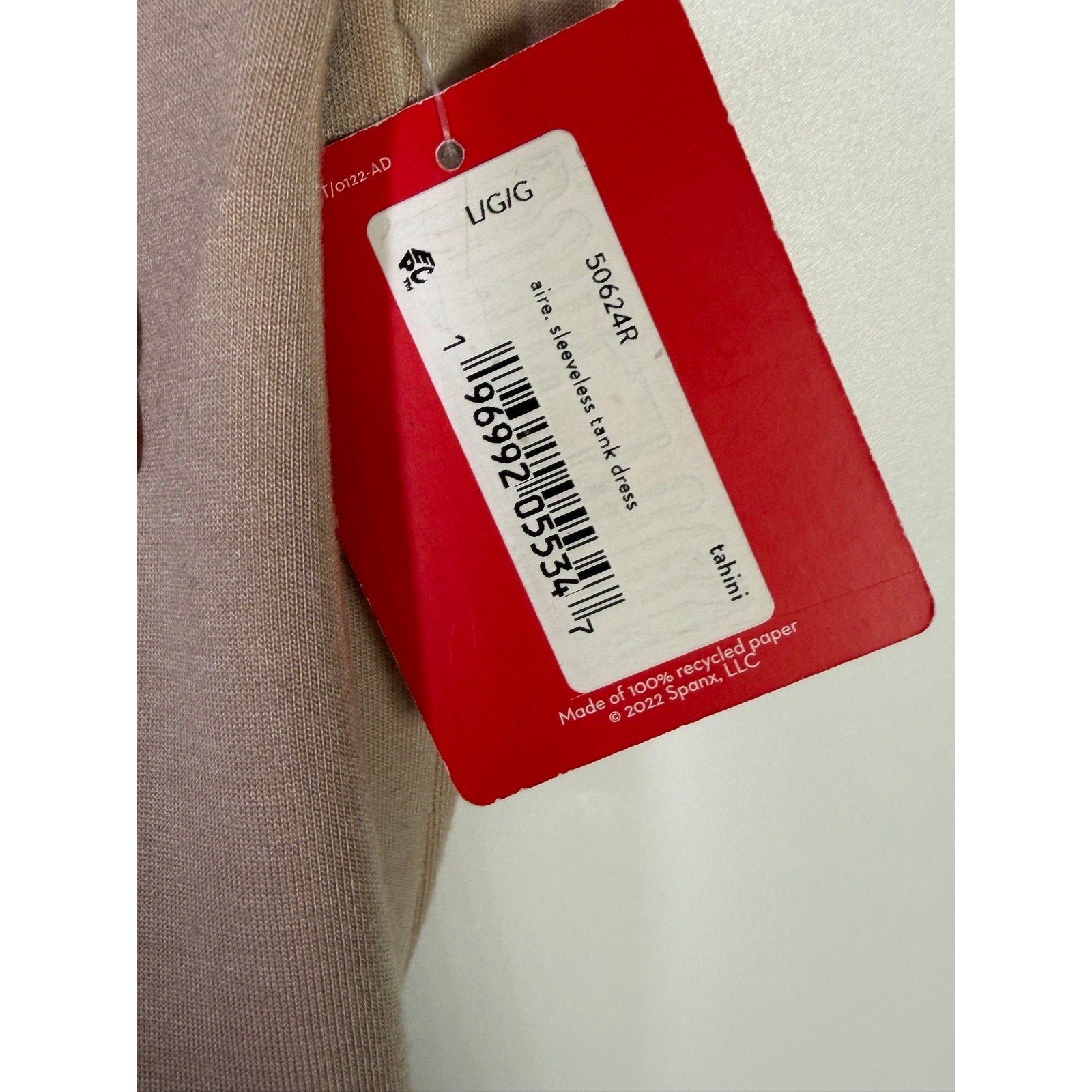 Spanx AirEssentials sleeveless tie-waist tank dress in Tahini, size large, featuring a relaxed fit and casual style.