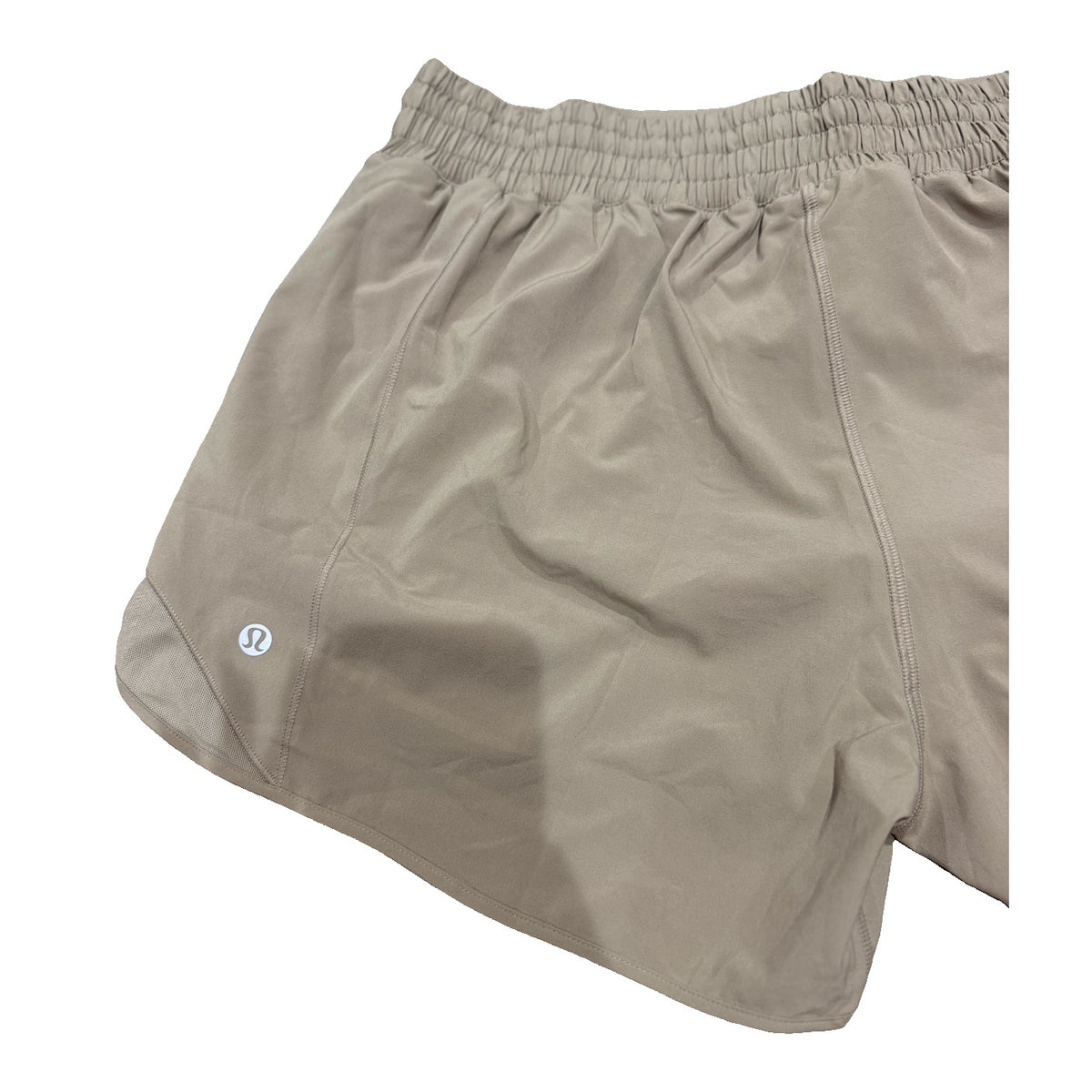 Lululemon Hotty Hot high-rise lined running shorts in tan beige for women, size 14, showing the front view with waistband and lining.