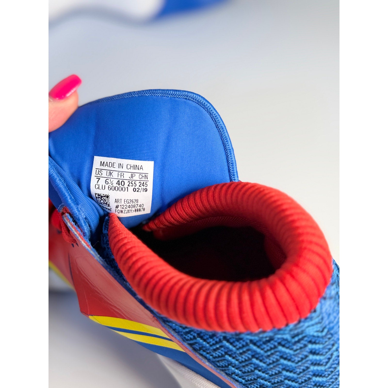 Adidas Exhibit A Captain Marvel basketball shoes in blue and red for men, US size 7, featuring sporty design and logo details.