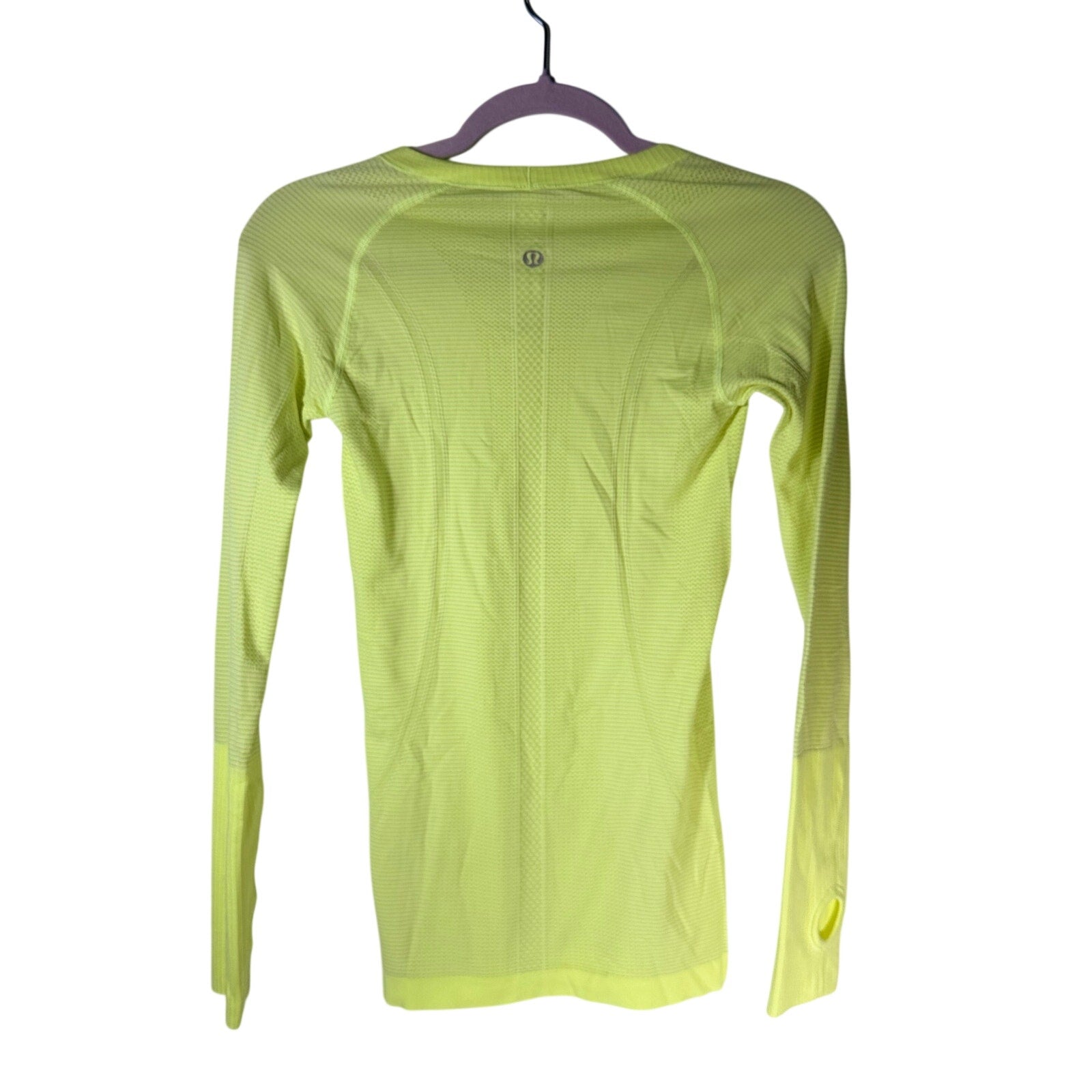Lululemon Swiftly Tech long sleeve shirt for women, size 4, lightweight athletic tank top in a sleek design.