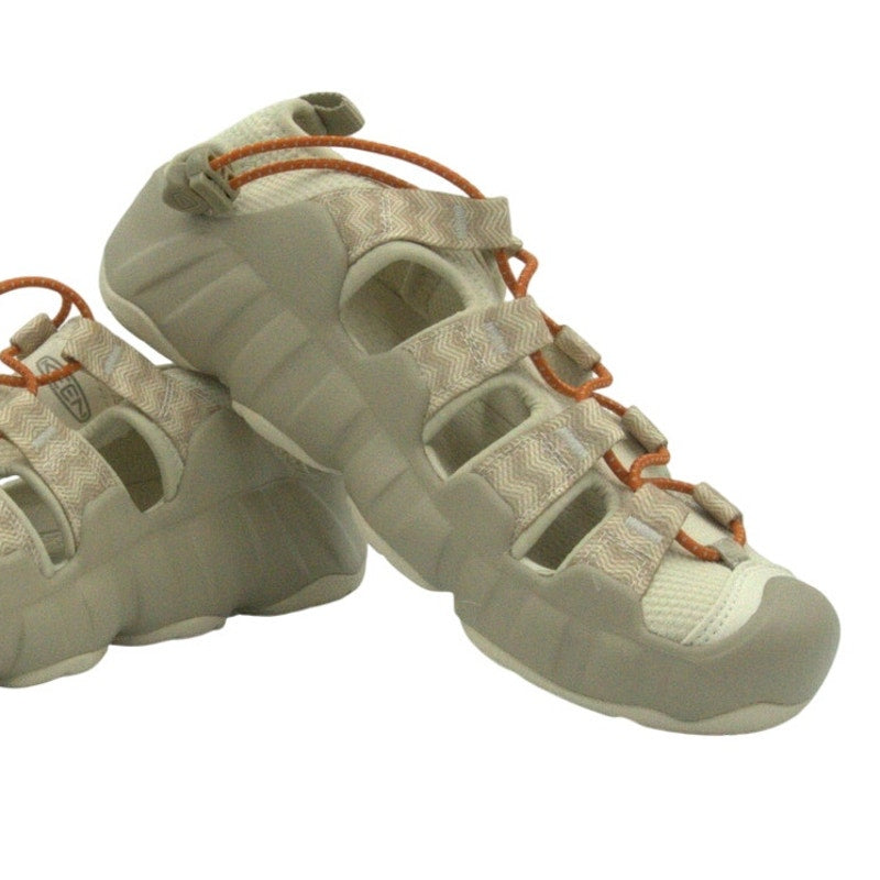 Keen Whisper women’s closed-toe hiking sandals in US size 8.5, featuring adjustable straps, neutral color, and durable rubber sole.