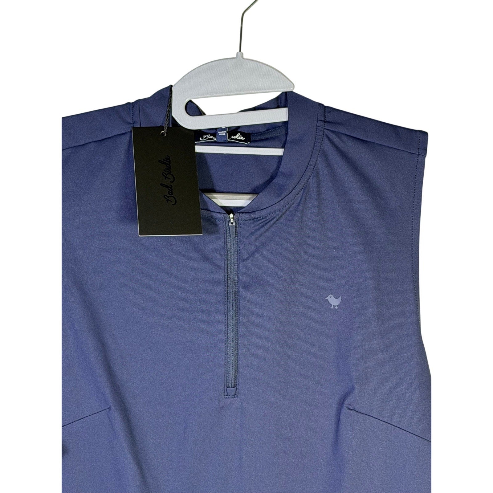 Bad Birdie women's blue sleeveless quarter-zip golf polo tank top, medium size, stylish and sporty for activewear.