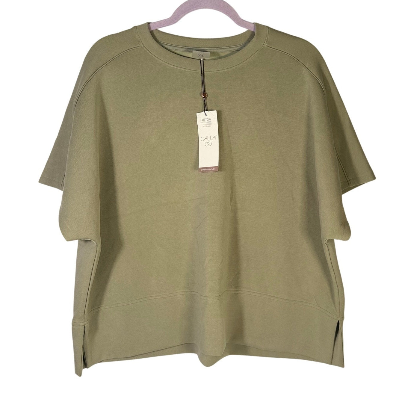 Calia Women's Sandwash Short Sleeve Pullover in Ground Fennel, size XXL, displayed flat showing soft fabric and relaxed fit.