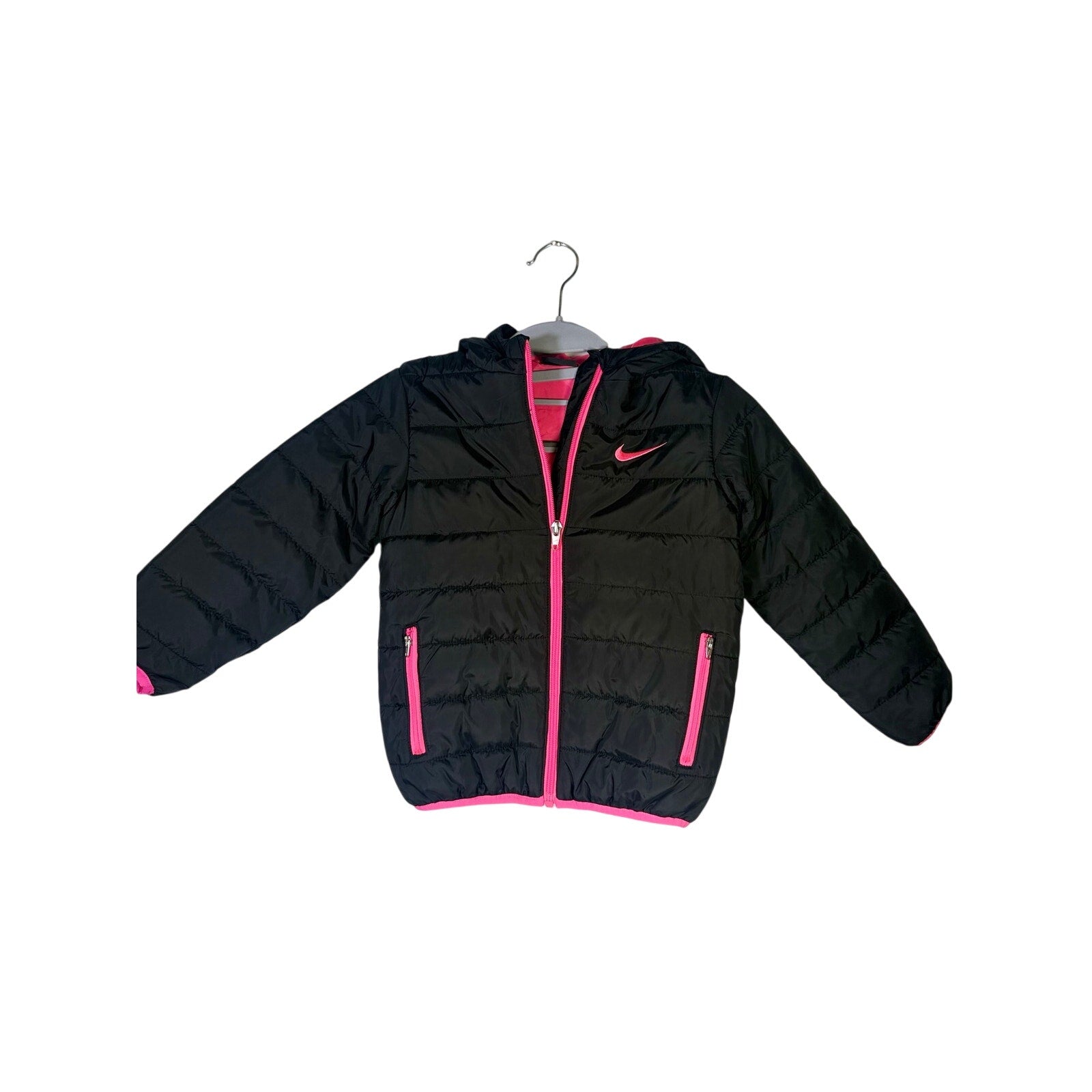 Nike toddler girls’ black and pink hooded puffer jacket, size 4T, featuring a cozy hood and lightweight insulated design.