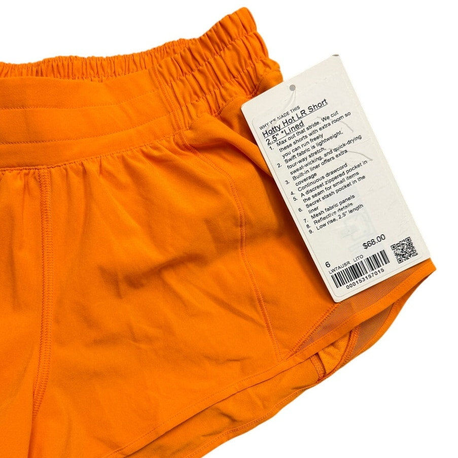 Lululemon Hotty Hot Low-Rise 2.5-inch lined women's athletic shorts in black, showing the waistband and lightweight fabric.