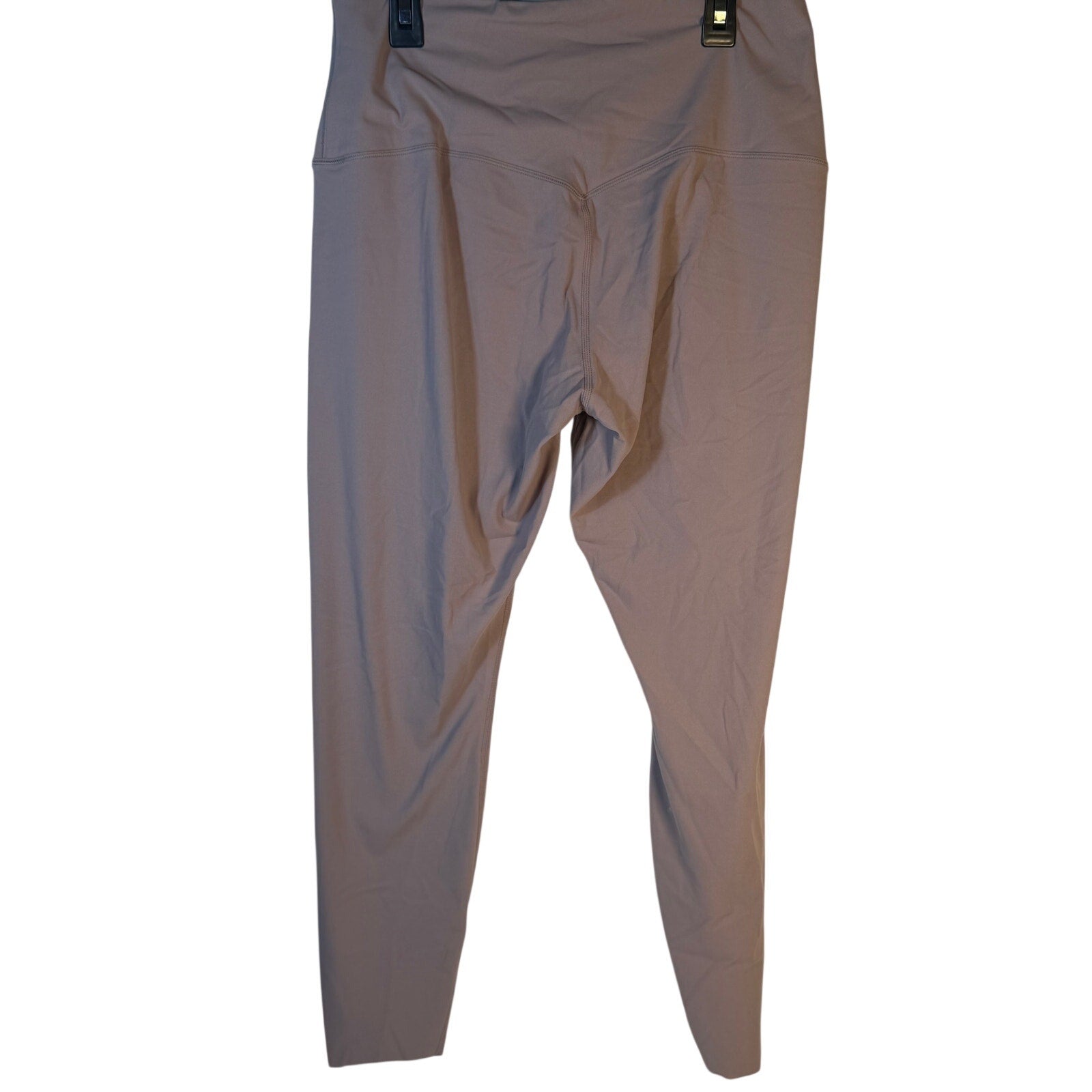 Nike women's high-rise full-length taupe leggings, size large, designed for training and active wear.