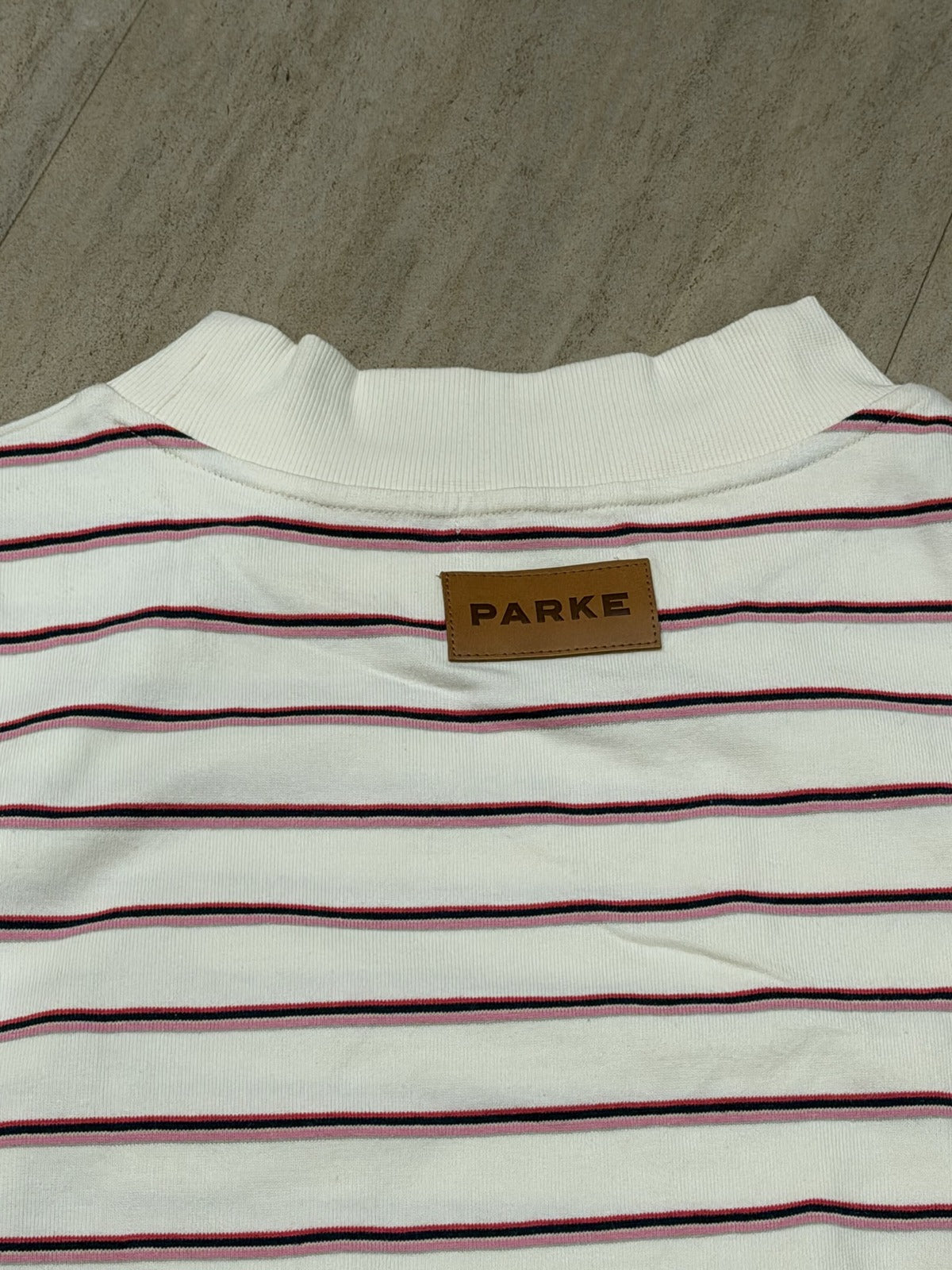 Parke Women's XXL striped mock neck sweatshirt in cream, pink, navy with leather logo patch, casual clothing style.