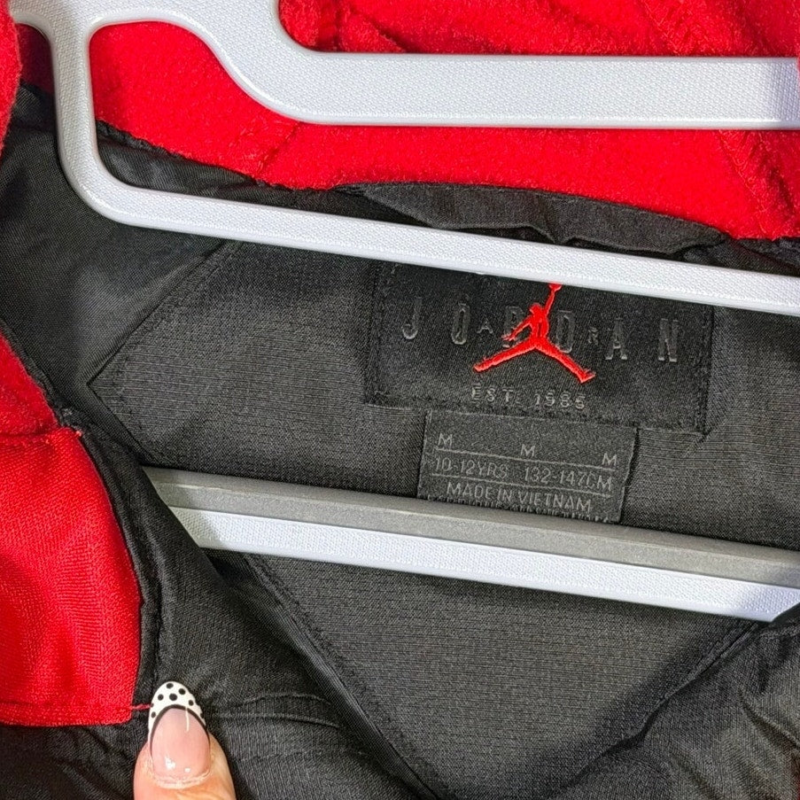 Jordan boys' black and red hybrid puffer jacket in size M 10-12, hooded, full zip, with padded design and sporty style.