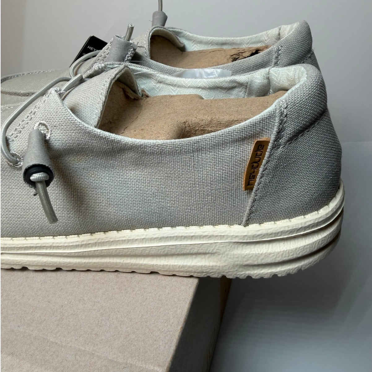 Hey Dude Wendy Chambray women's sneakers in light grey, size 8, casual shoes with comfortable fabric upper and slip-on style.