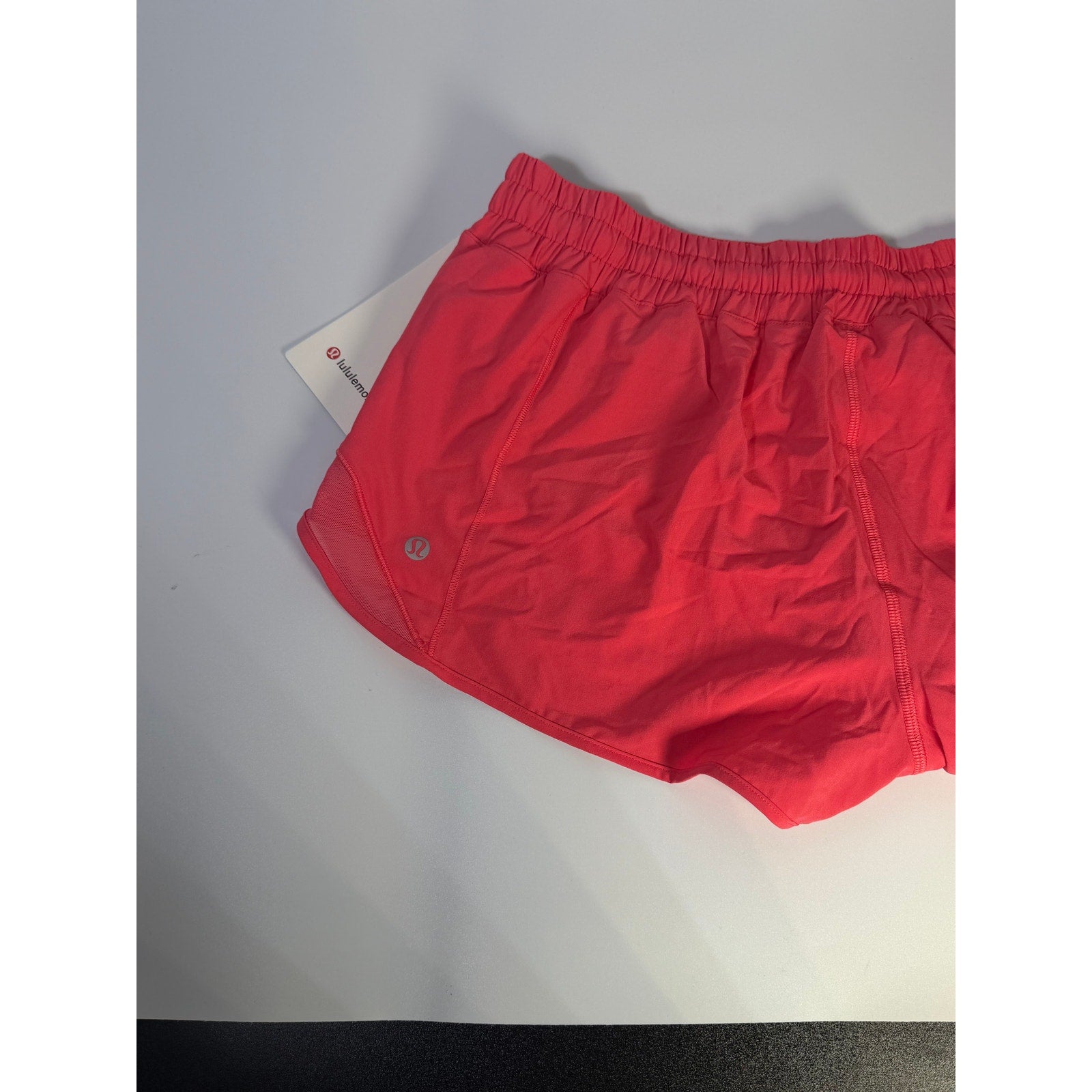 Lululemon Hotty Hot lined shorts in Glaze Pink, low rise, 2.5-inch length, women's size 14, front view