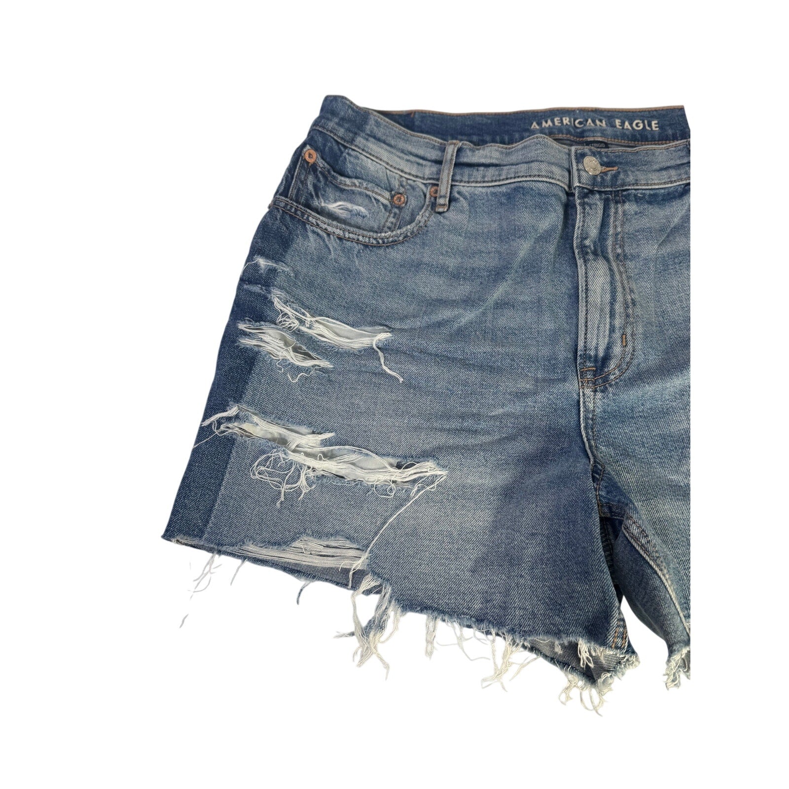American Eagle Strigid relaxed high-rise distressed denim shorts for women, size 14, shown on a model with rolled cuffs and frayed hem.