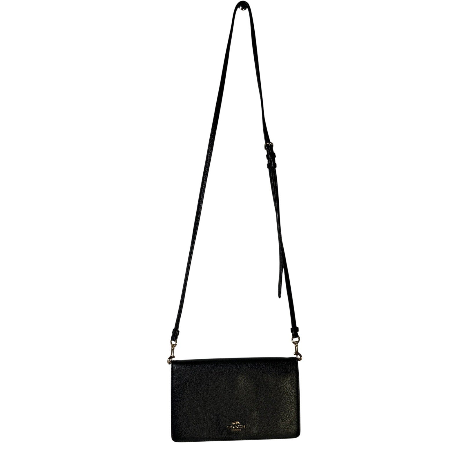 Black leather Coach women's foldover crossbody wallet bag with adjustable strap, featuring a sleek compact design.